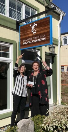 Donation of proceeds from silent auction to Chryseis Green of the Saanich Peninsula Hospital Foundation